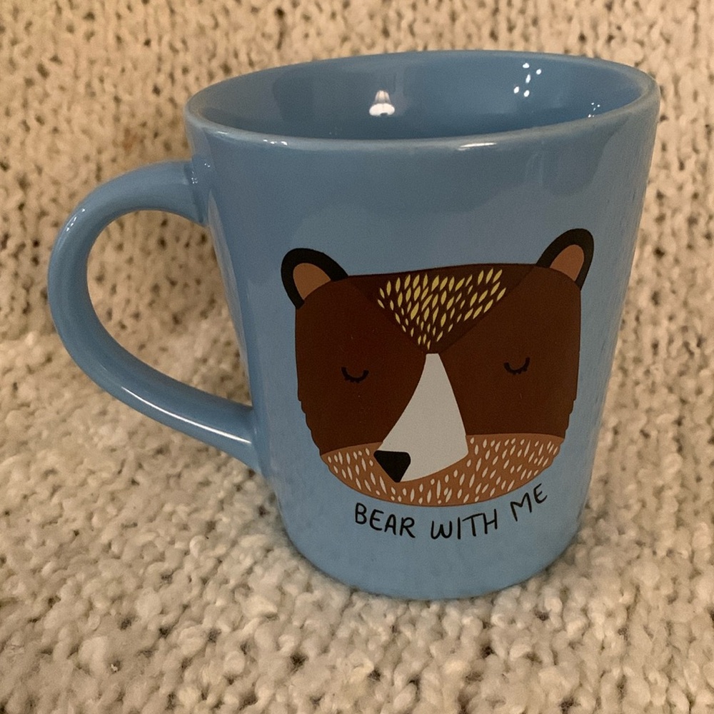 Indigo mug, brown bear on blue background.